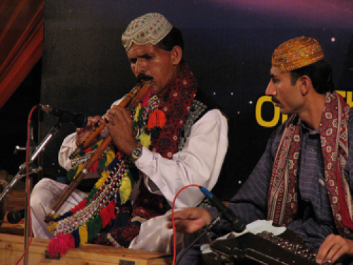 Pakistani artists play at a Sindhi musical event.