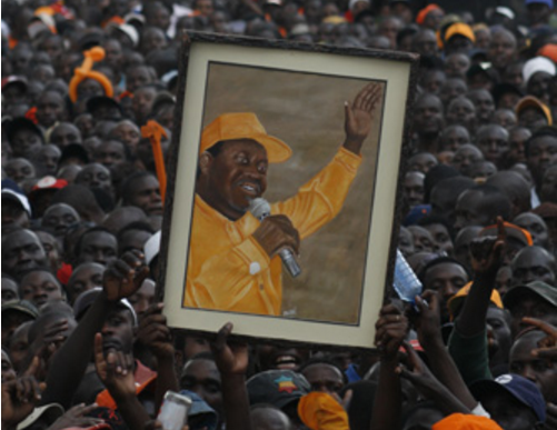 Orange Democratic Movement supporters hold up a portrait of Raila Odinga. Image via WikiCommons.