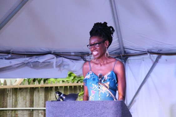 Cave Canem poet Lyrae Van Clief-Stefanon reads in the Alphabet City Tent. Image via City of Asylum. Rights reserved.