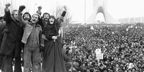 Demonstrators in Shahyad Square, Tehran, during the 1979 Revolution. Image via: Wikimedia Commons.